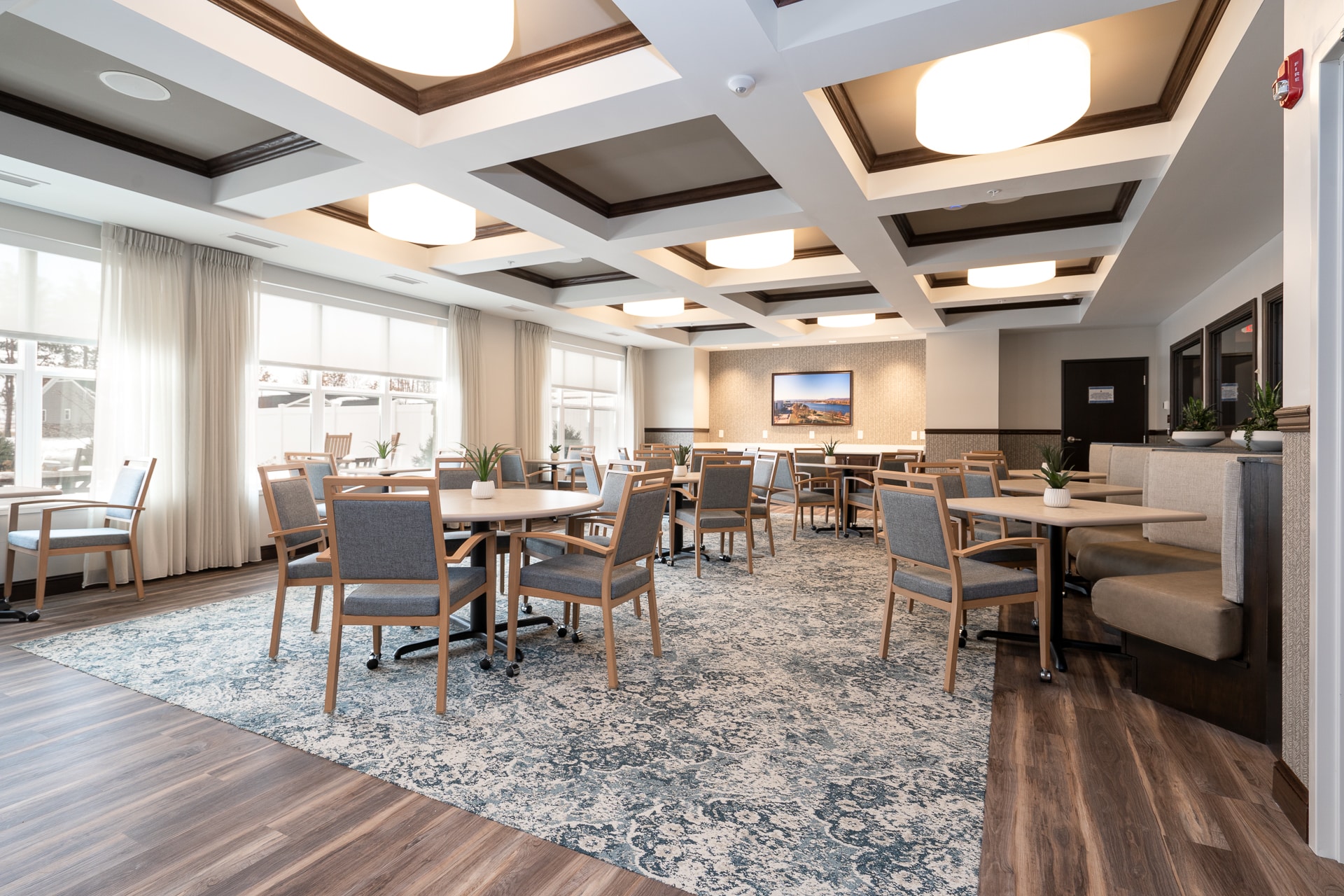 Bright common area with tables and chairs