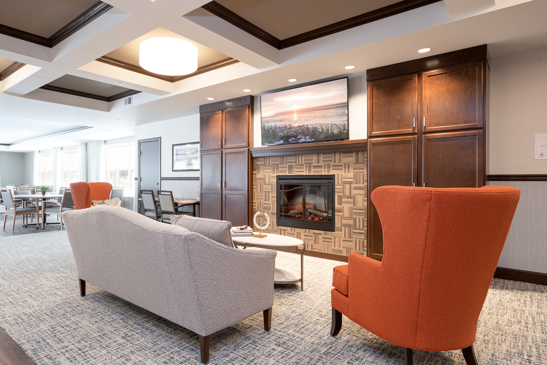 Cozy common area with a fireplace and seating