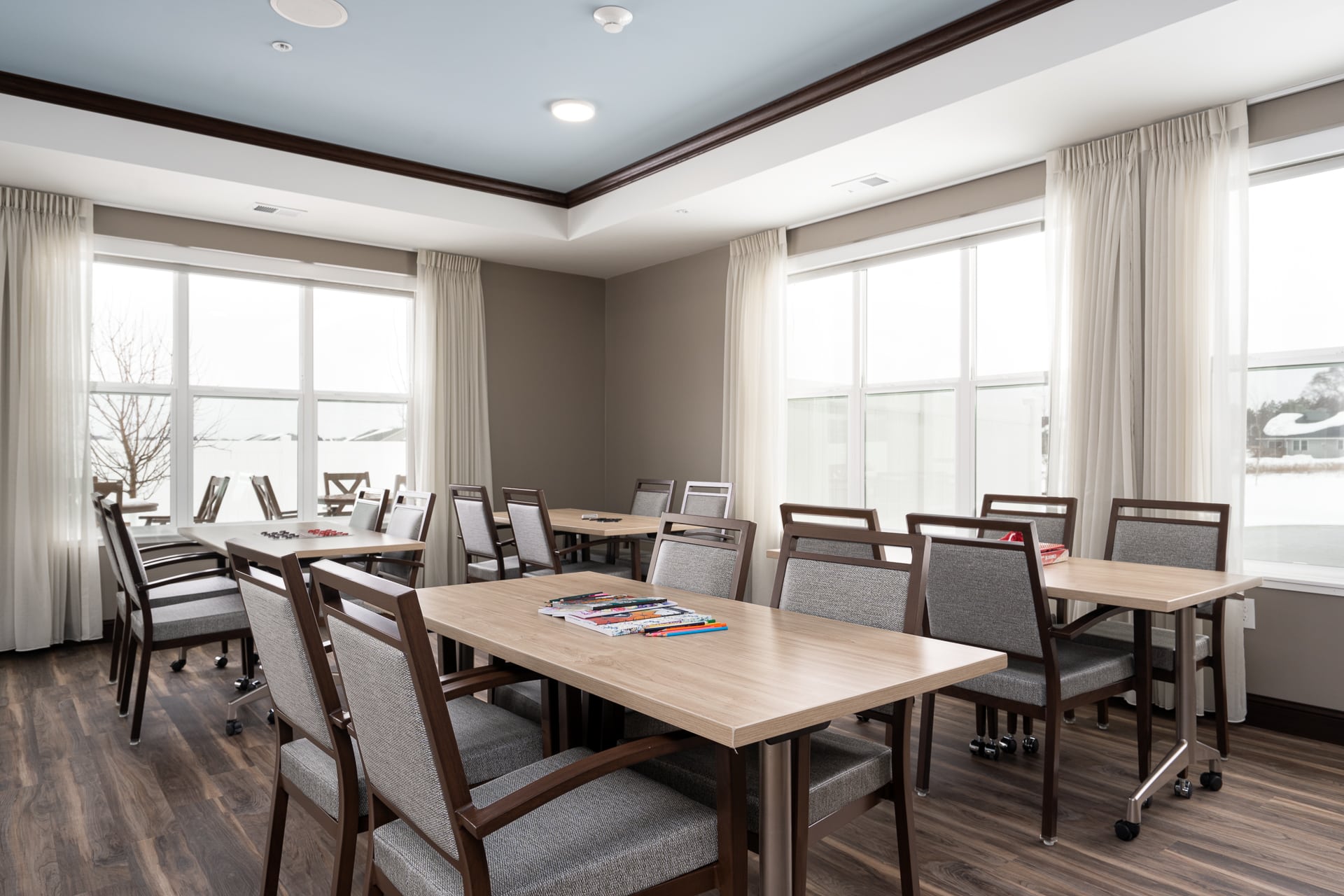 Interior common area with seating and tables.