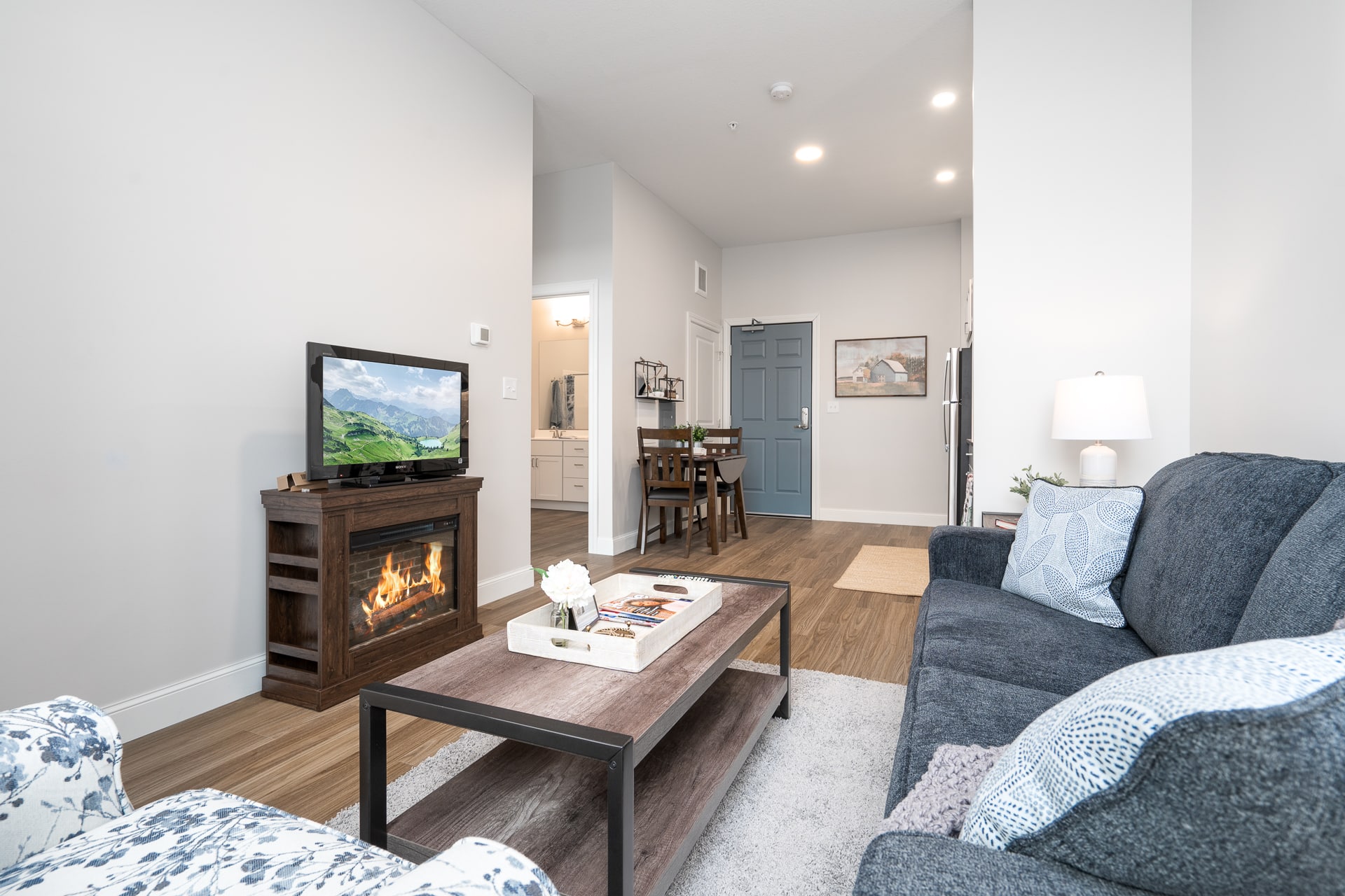 Cozy living room with a fireplace and TV
