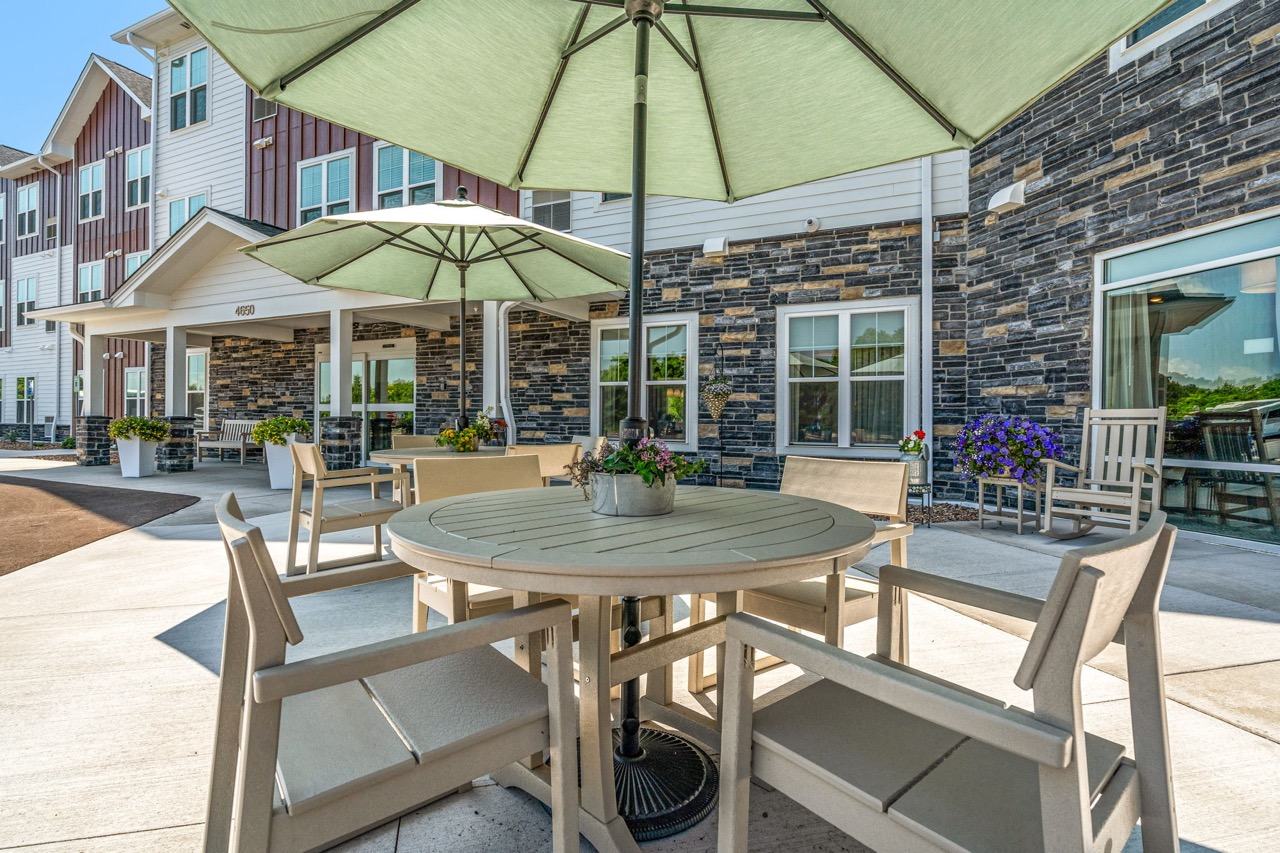 Outdoor seating area with umbrellas and flowers