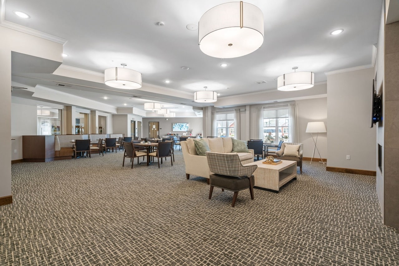 Spacious common area with seating and lighting