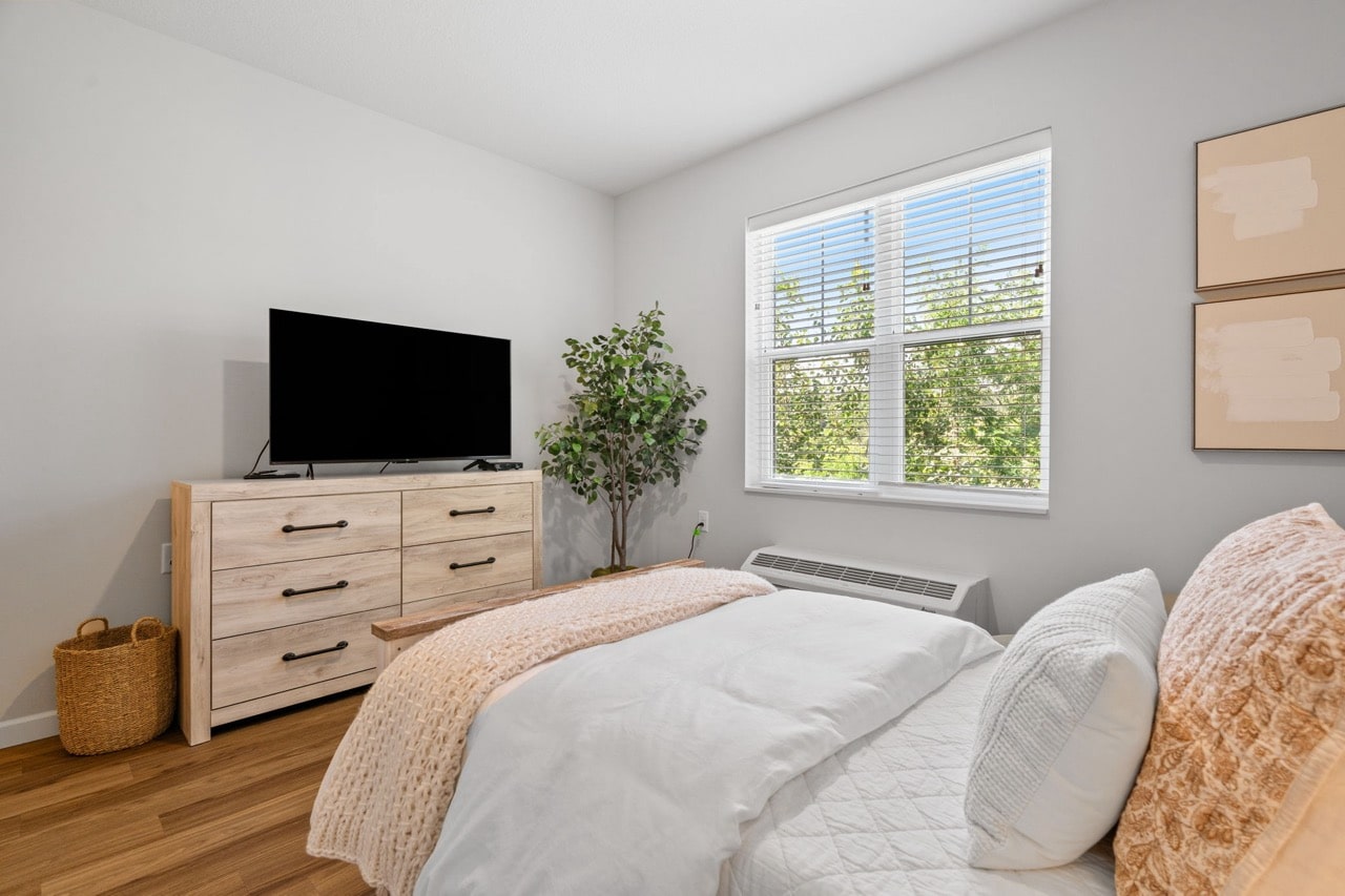 Bright interior view of a cozy bedroom