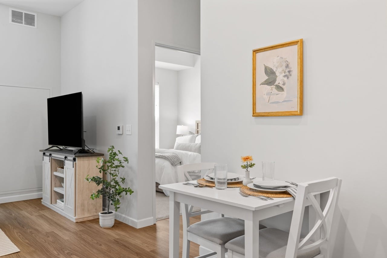 Cozy dining area in a senior living unit.