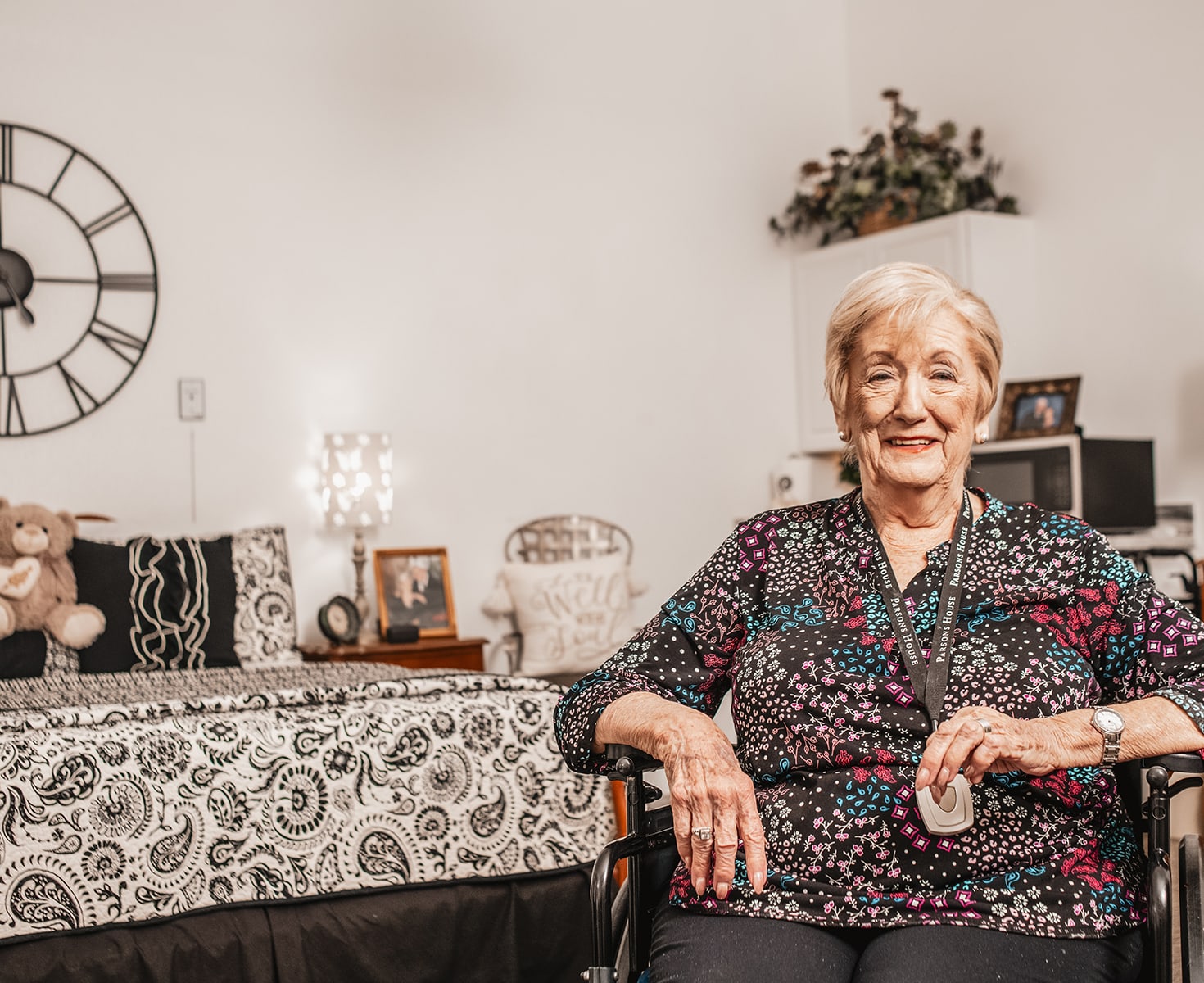 Resident in wheelchair in private room
