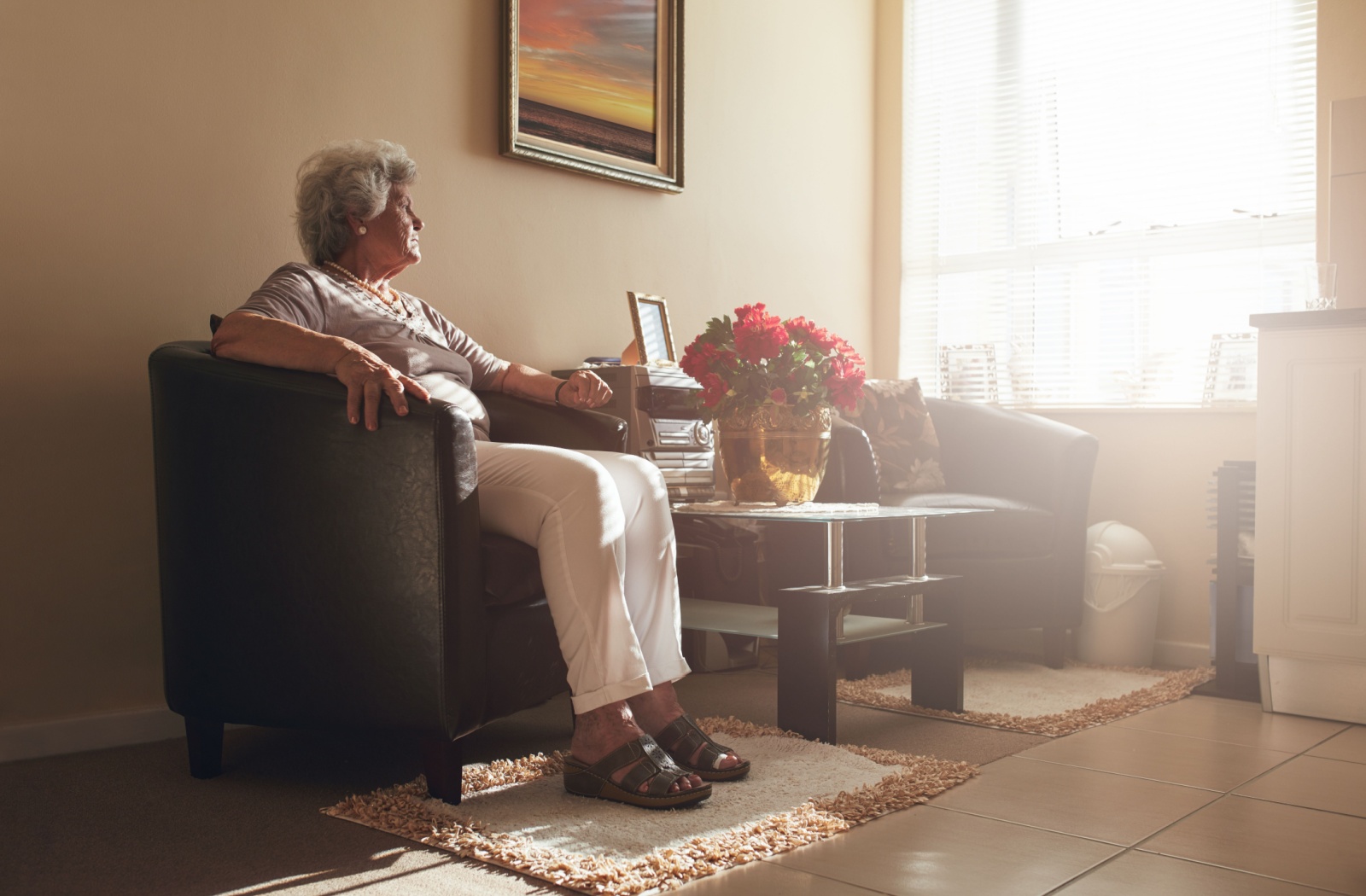 Senior woman enjoying time in a cozy living area