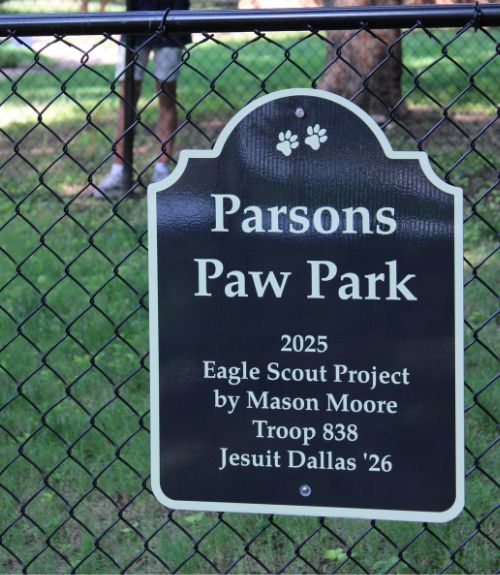 Sign for Parsons Paw Park with Eagle Scout Project details.