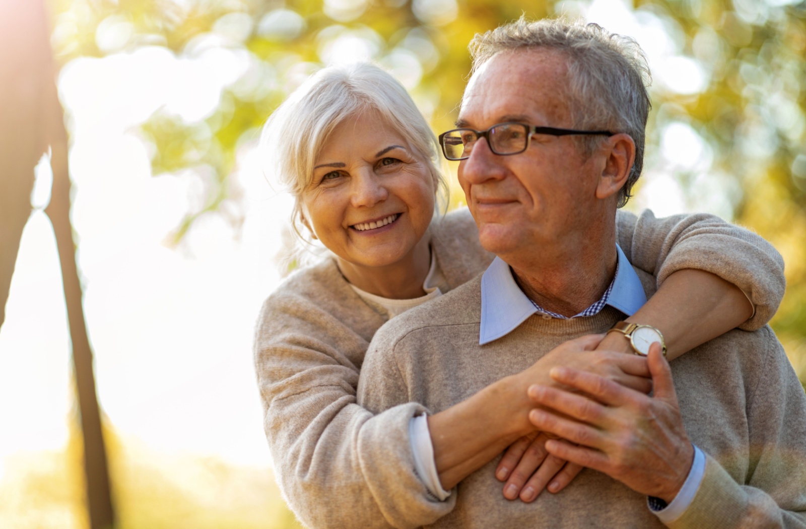 Elderly couple enjoying time outdoors together.