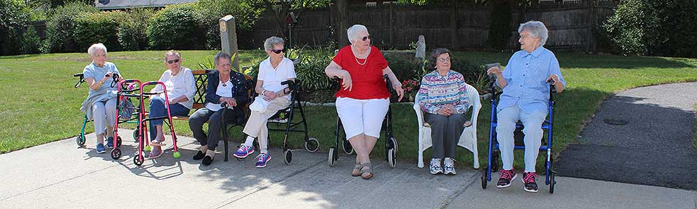 Residents enjoying time outside on a sunny day.