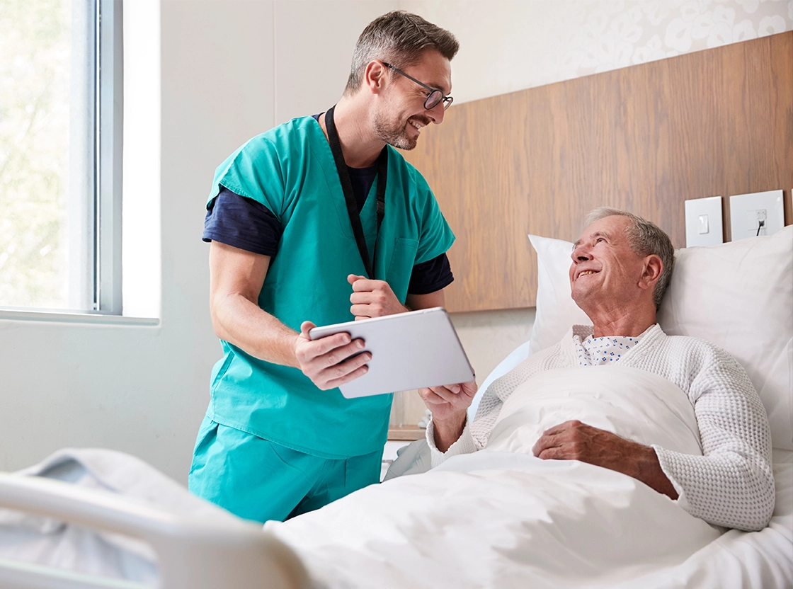 Healthcare worker engaging with senior resident