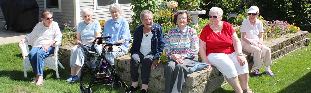 Residents enjoying time outdoors in the garden