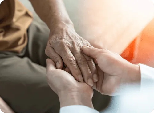 Interwoven hands reflecting care and connection.