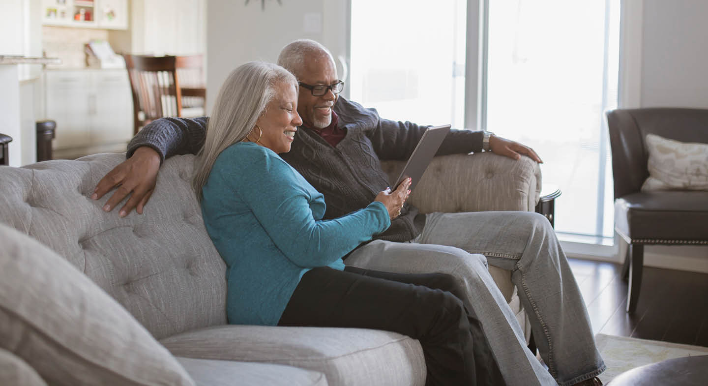 Couple enjoying time together on a sofa