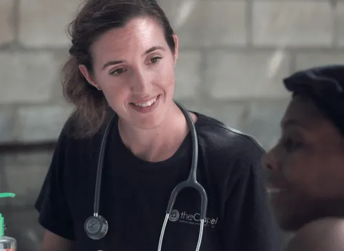 Health professional interacting with a resident.