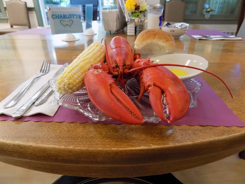 Lobster dinner served at a dining table