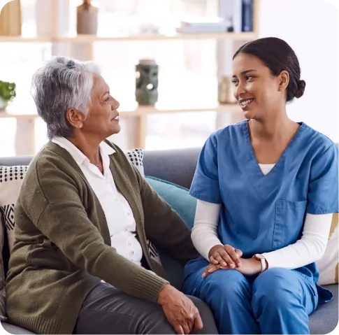 Resident interacting with nursing staff