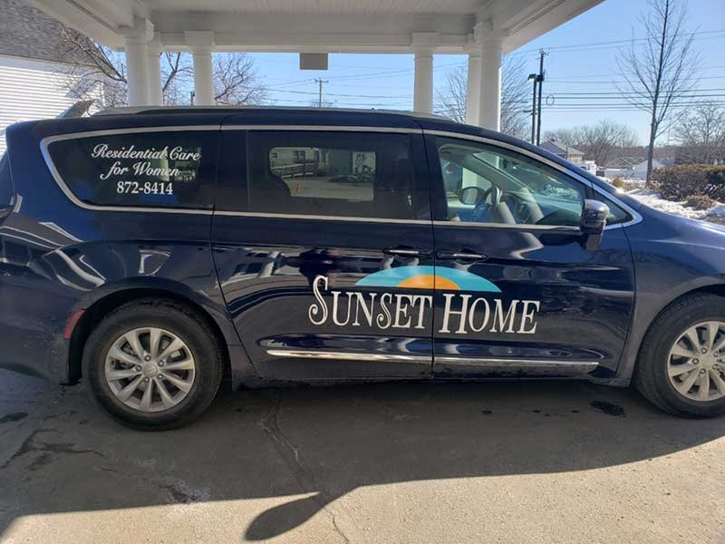 Facility transport vehicle with branding