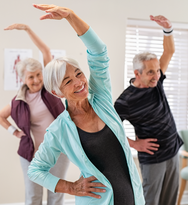 Seniors participating in a group exercise class
