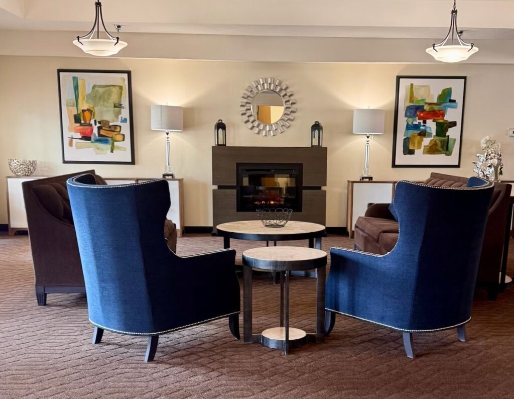 Cozy lobby seating area with artwork