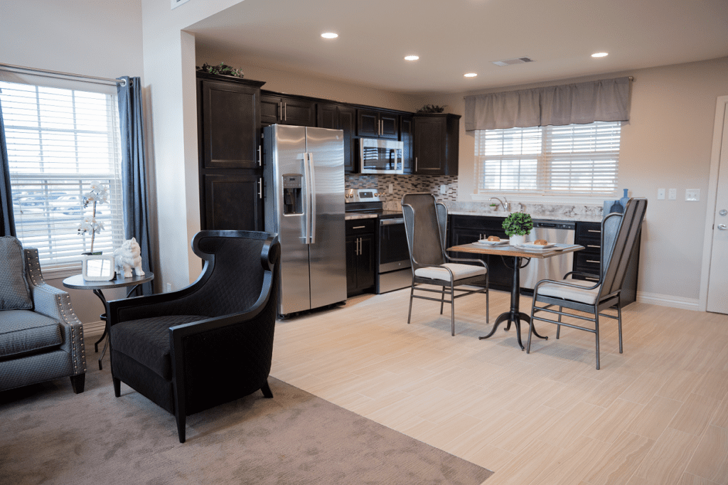 Modern kitchen and dining area in a resident room