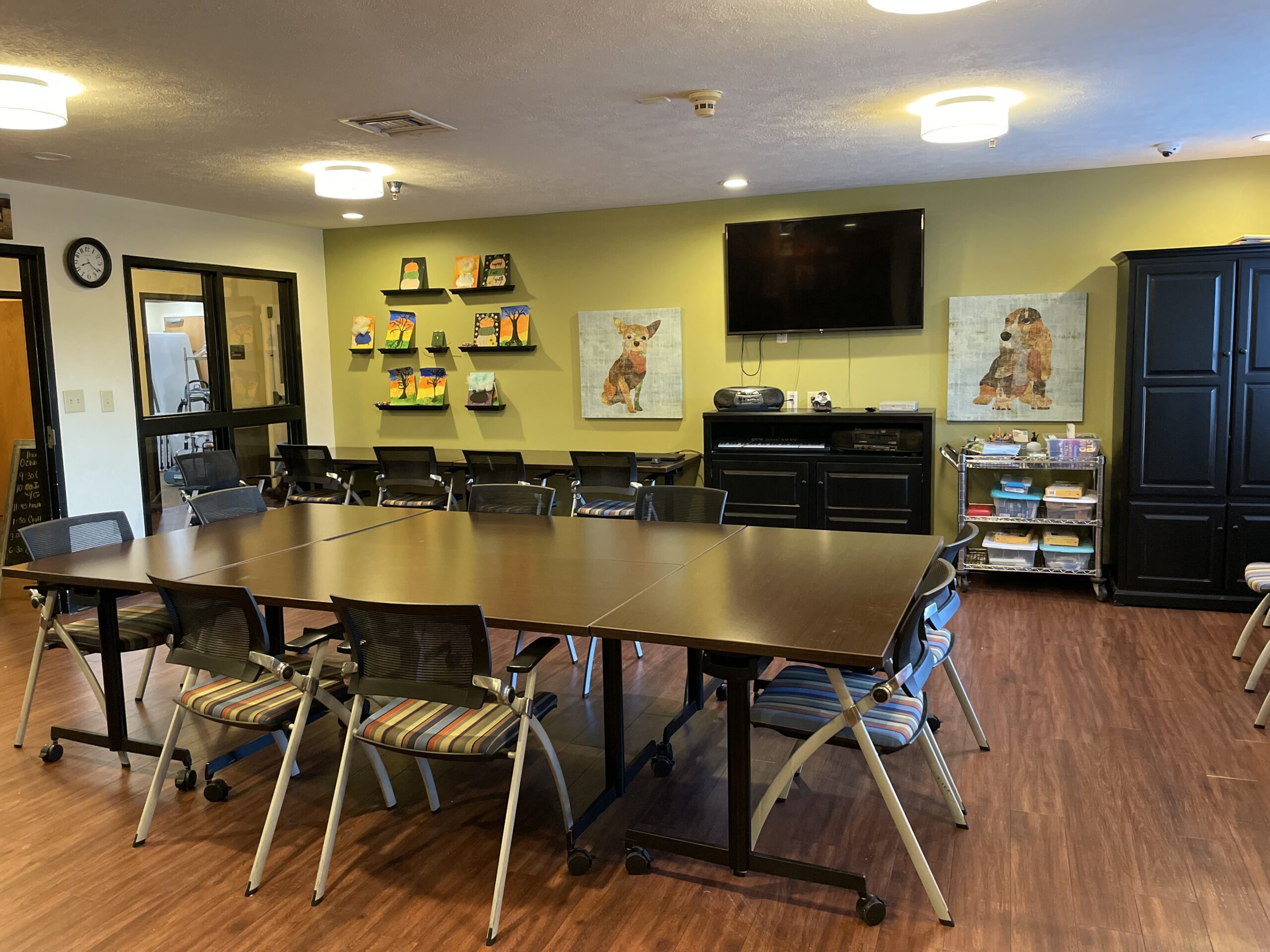 Common area with tables and chairs setup