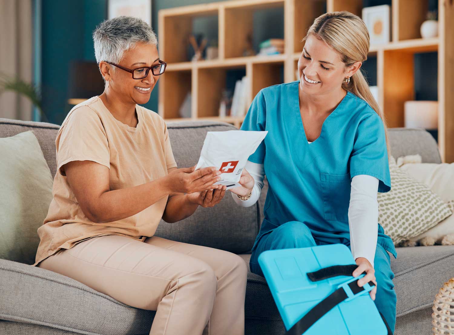 Resident and nurse engaging in conversation.