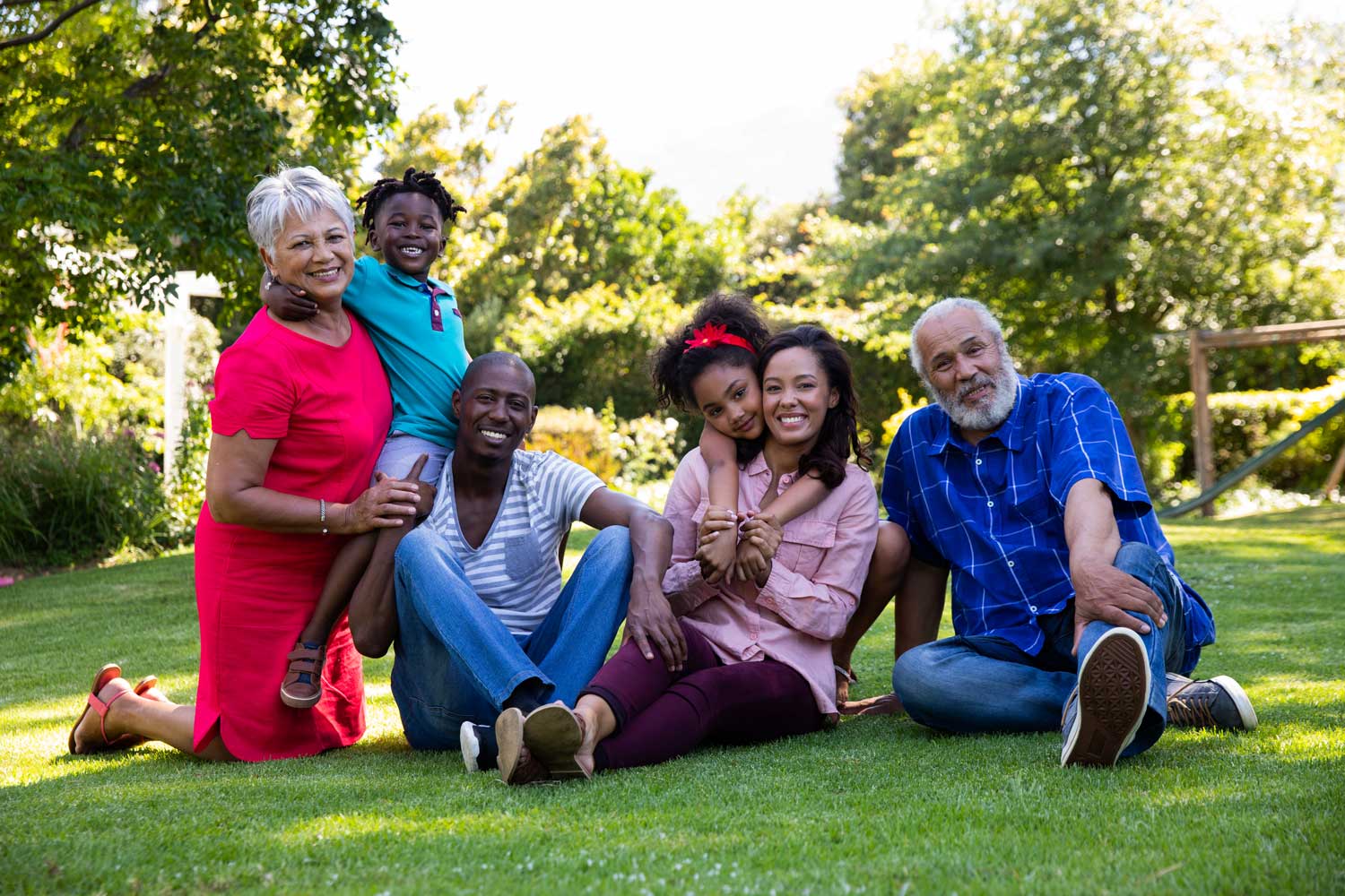 Multi-generational family outside in a garden
