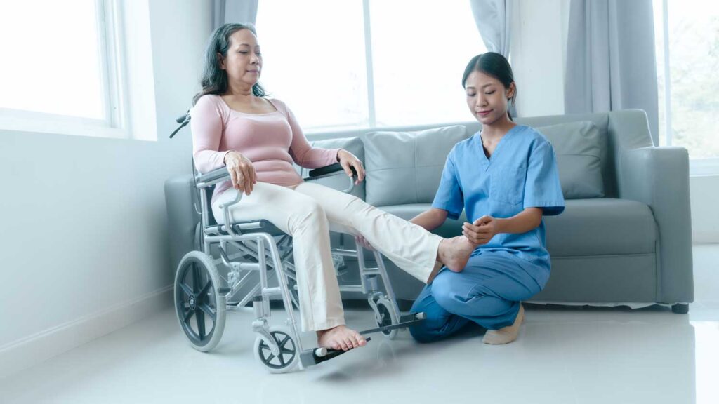 Healthcare worker assisting a resident in a wheelchair