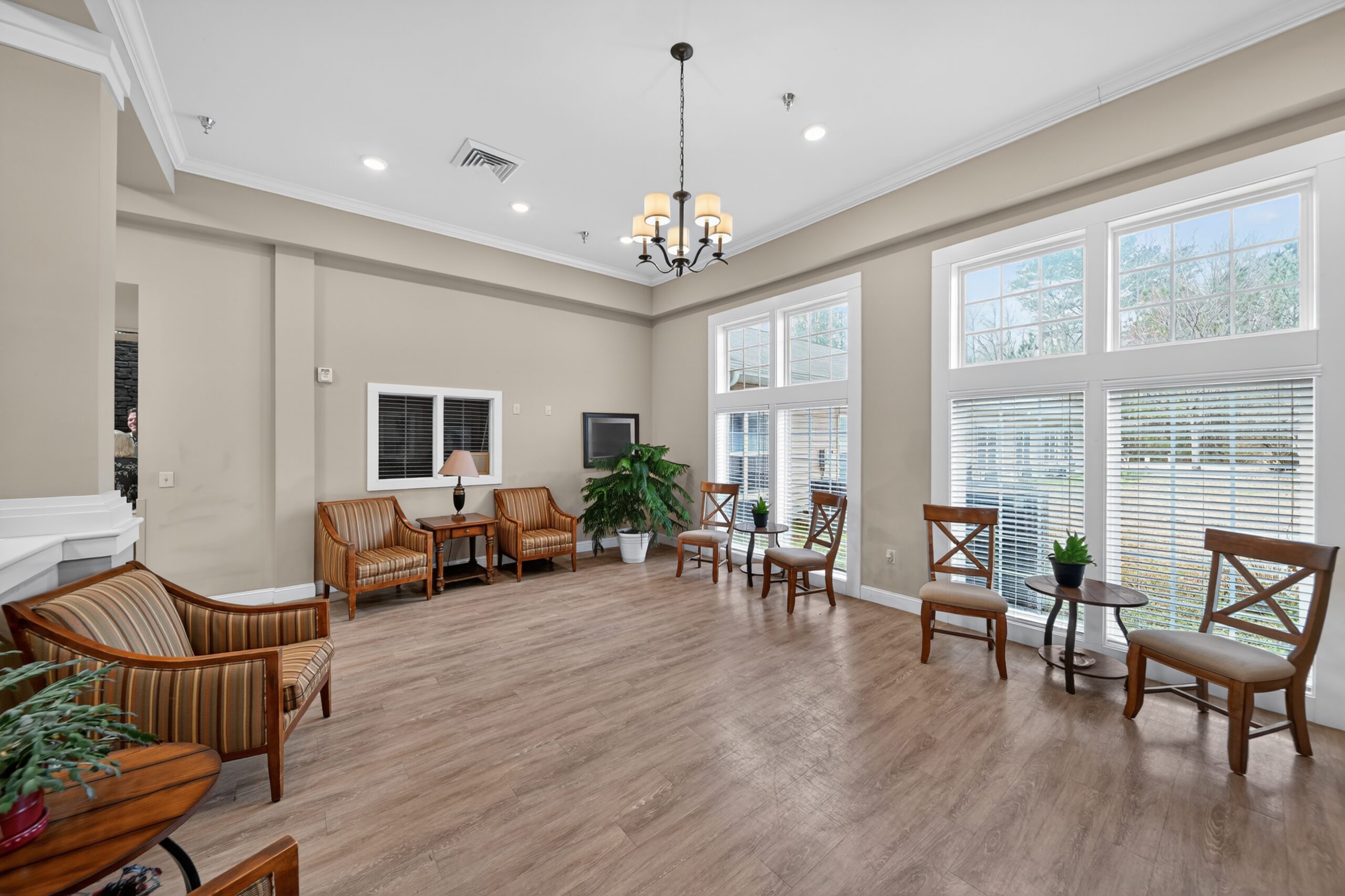 Bright common area with seating and windows