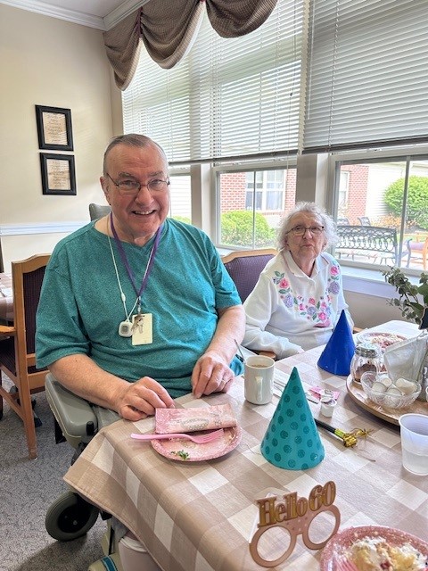 Residents enjoying a meal in dining area
