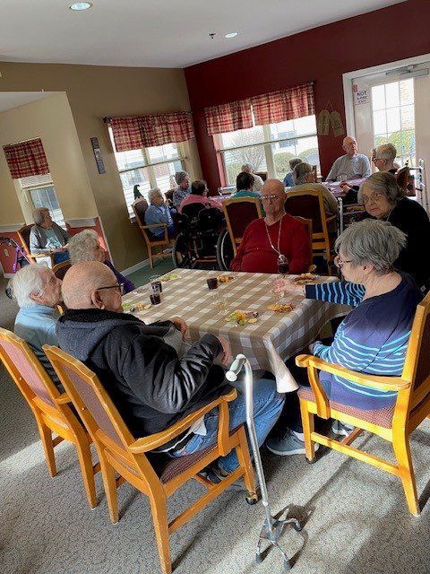 Residents socializing in a comfortable common area.
