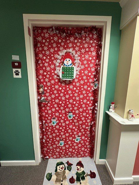 Decorated holiday door on a resident room