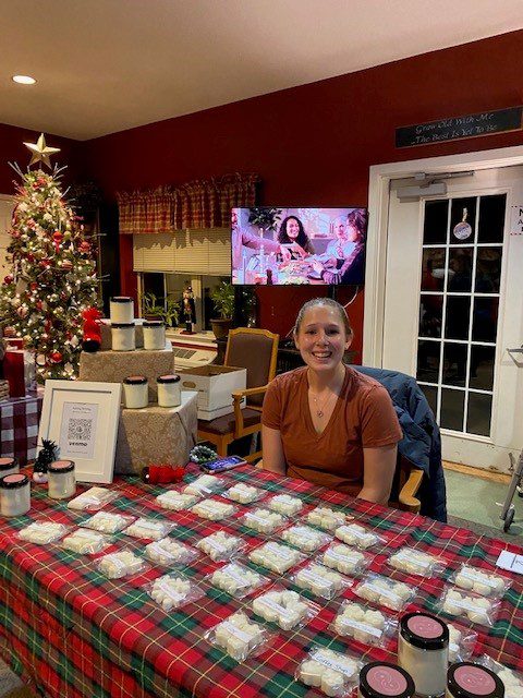 Resident participating in a holiday activity with decorations