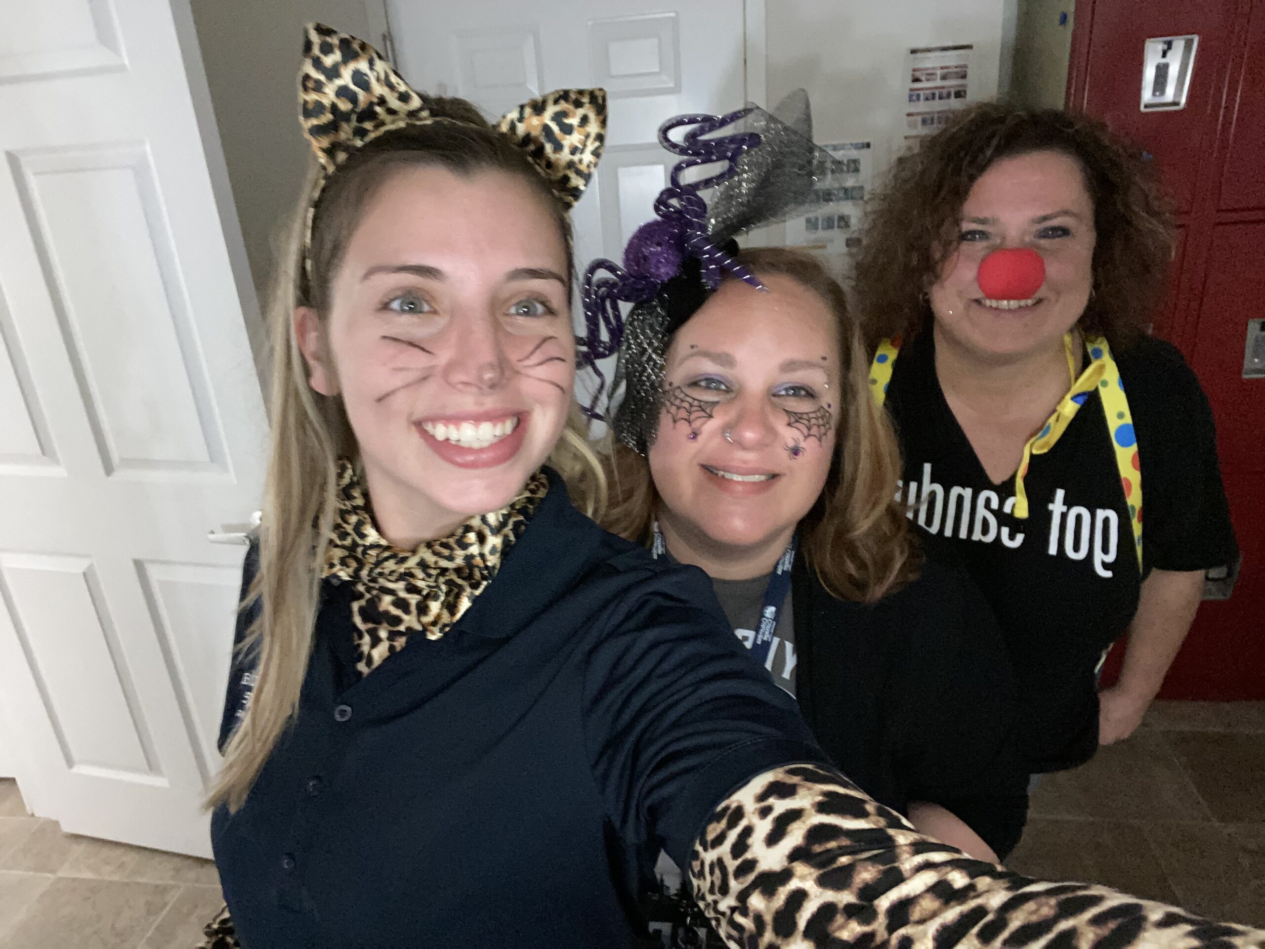 Staff members in festive costumes at the facility