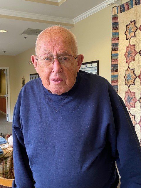 Senior man in a common area of a facility