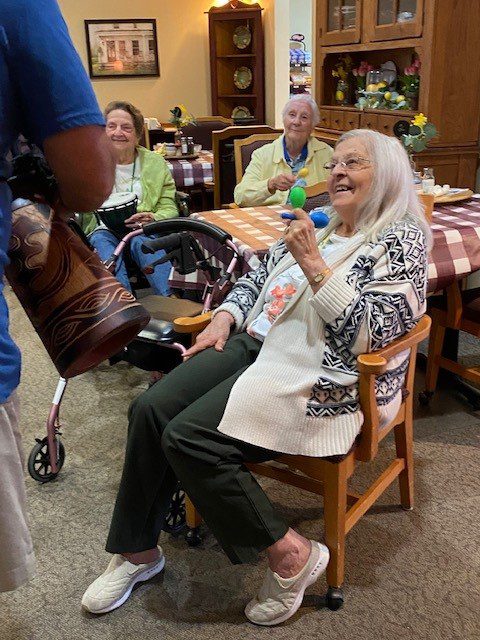 Residents enjoying an activity in a common area.