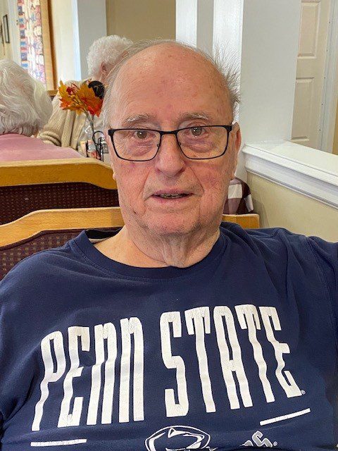 Senior man enjoying his time in a common area