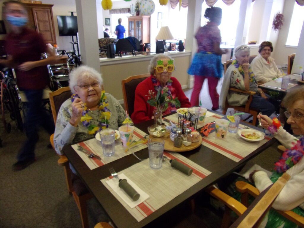 Residents enjoying a festive meal with decorations