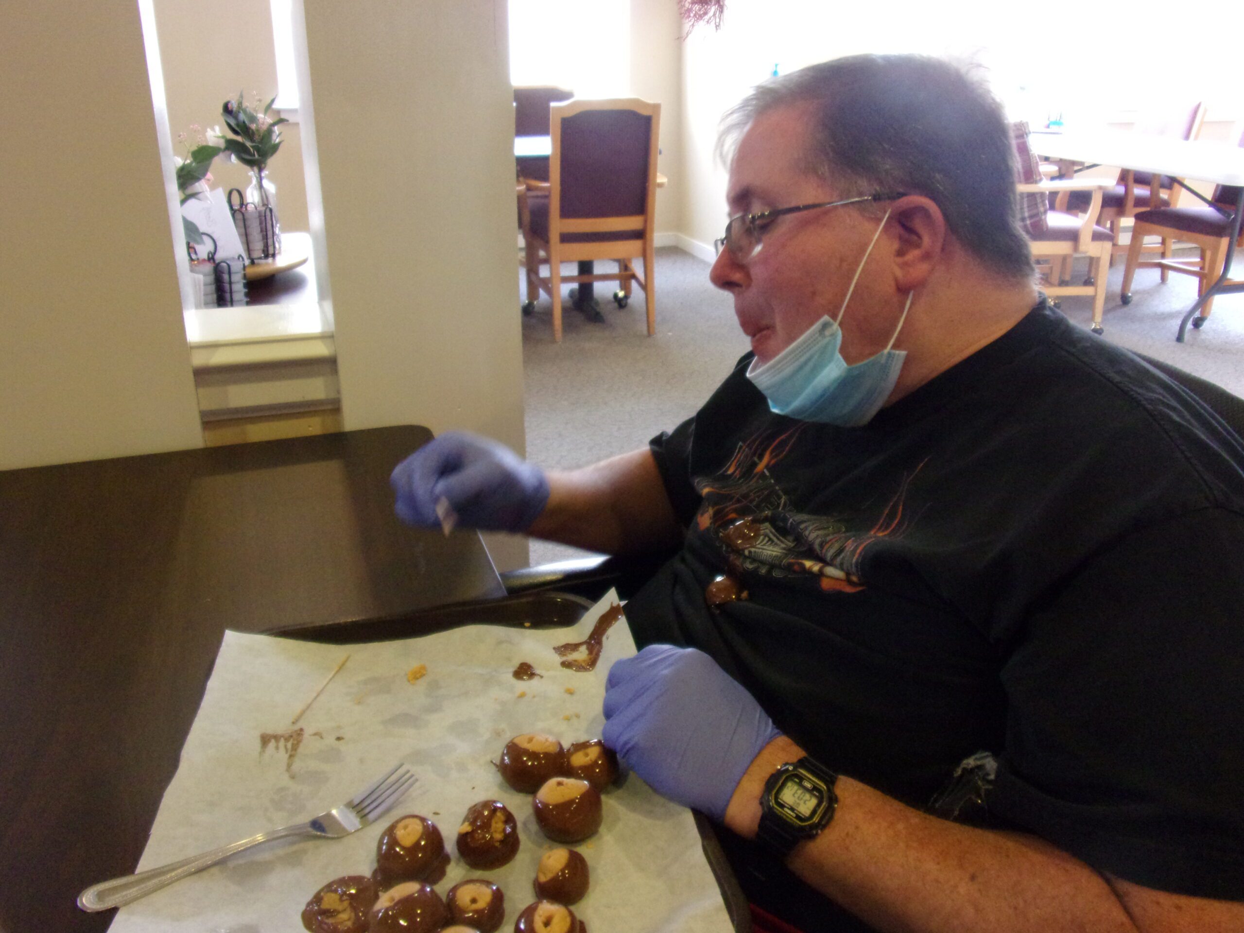 Resident enjoying chocolate treats in a common area