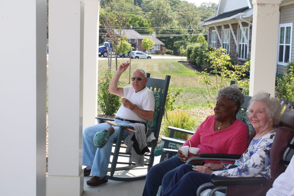 Residents enjoying their time on the porch