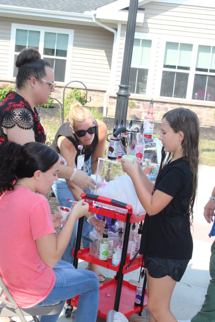 Residents and visitors enjoying an outdoor activity.