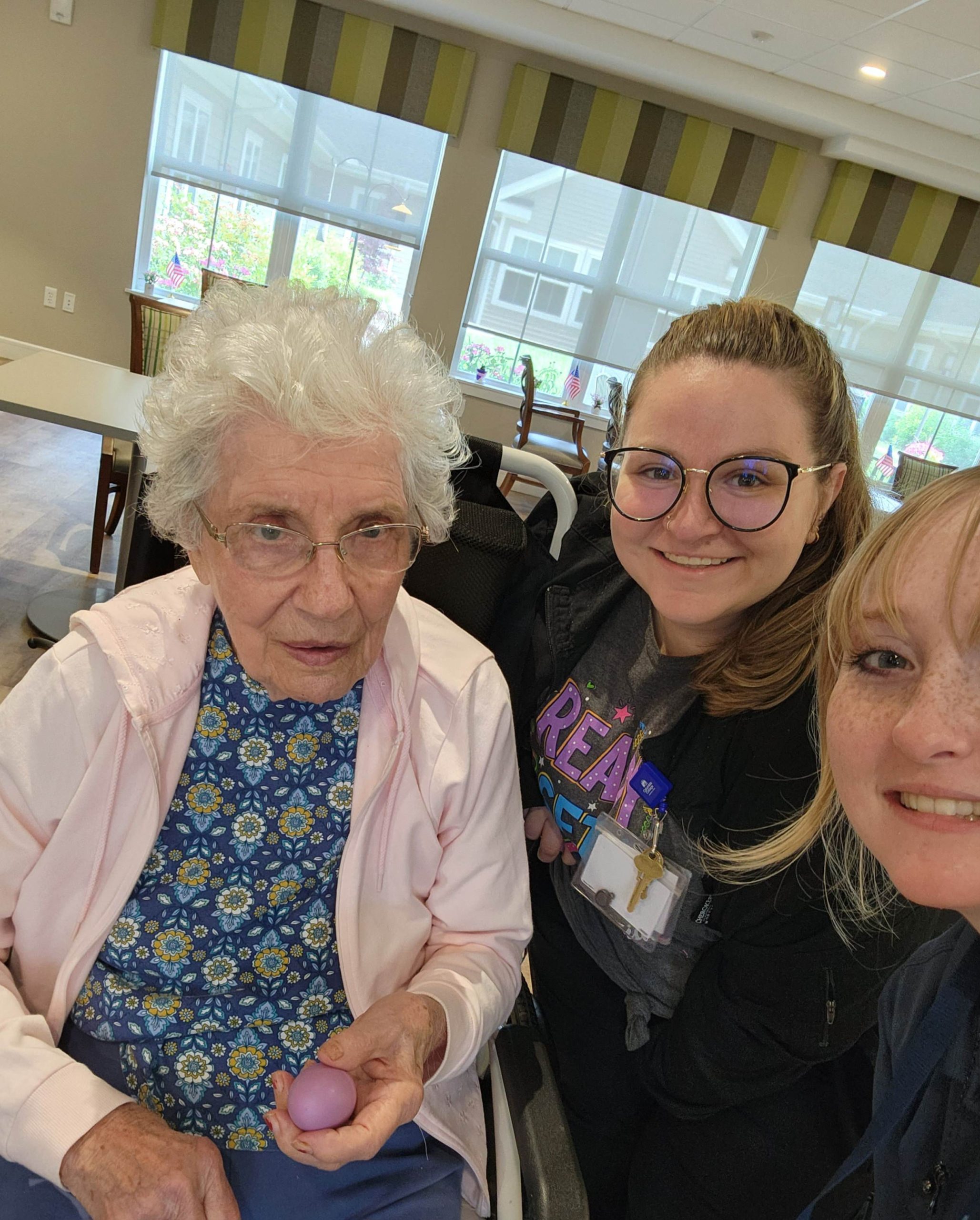 Residents and staff interacting in a common area
