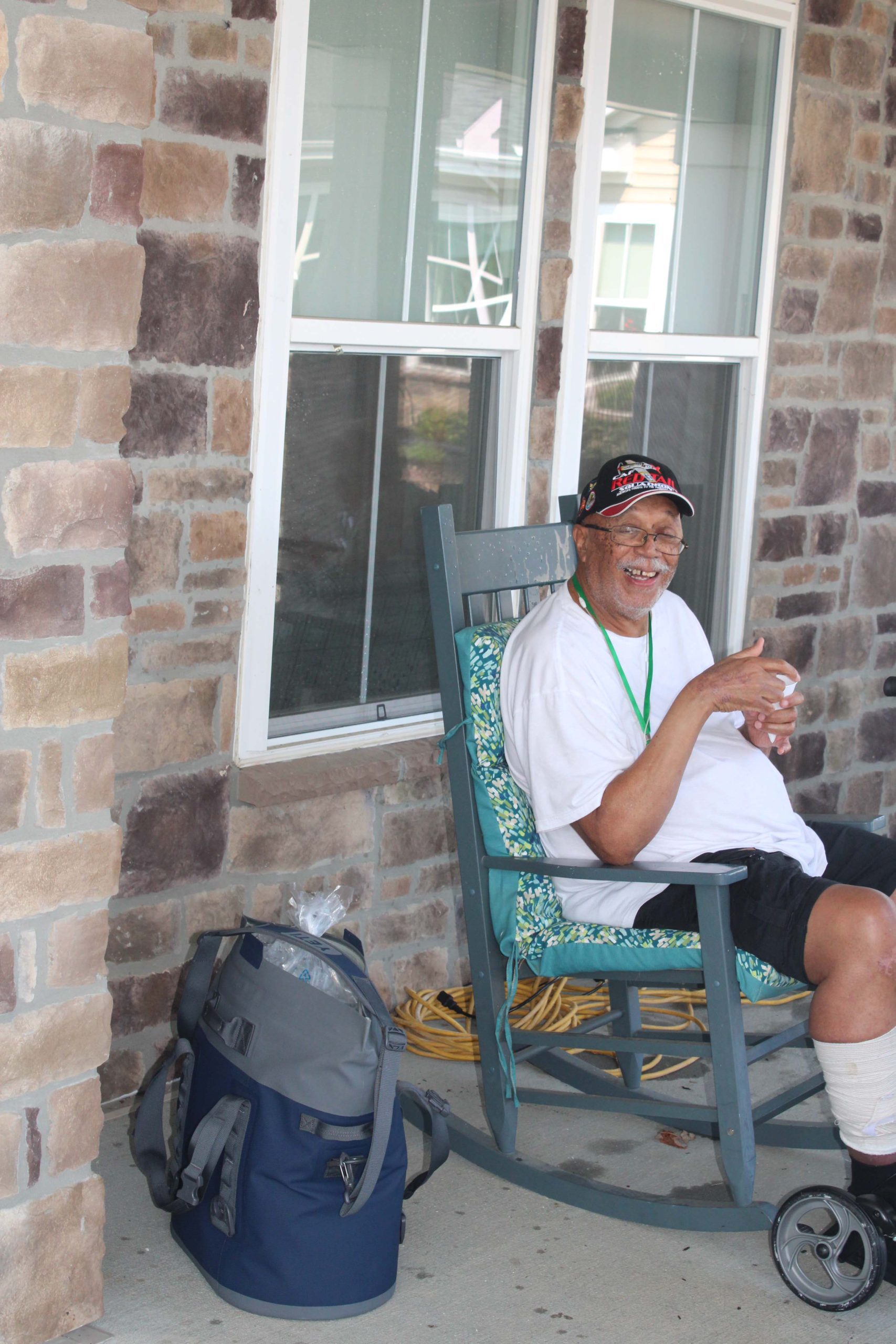 Resident enjoying time on a porch