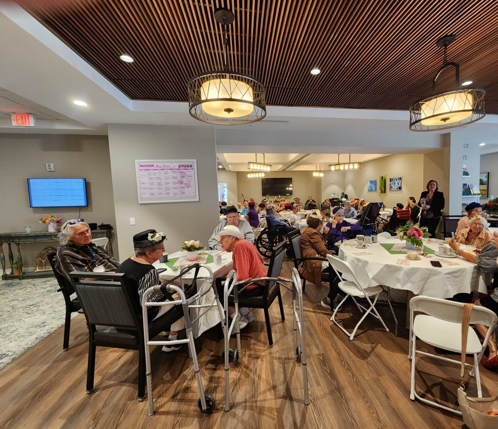 Residents enjoying a meal in the dining area.