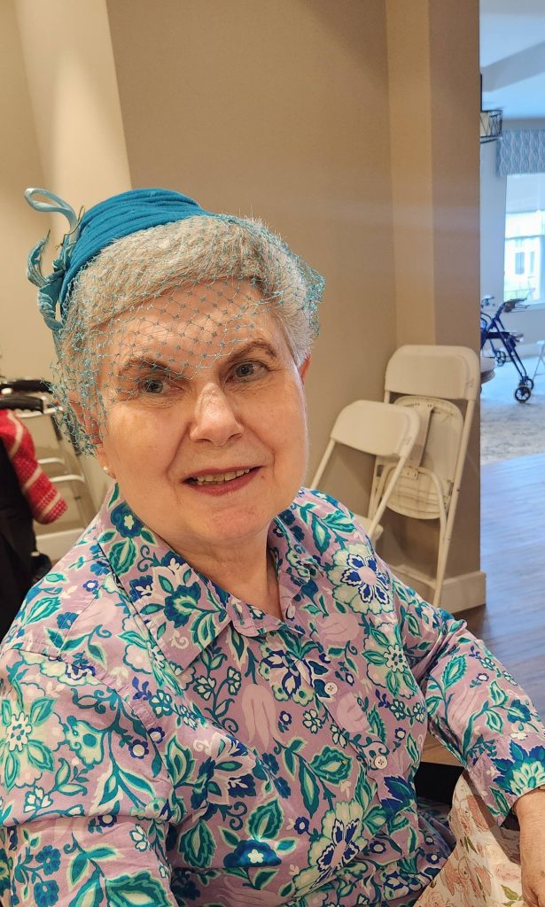 Smiling senior woman in a colorful outfit