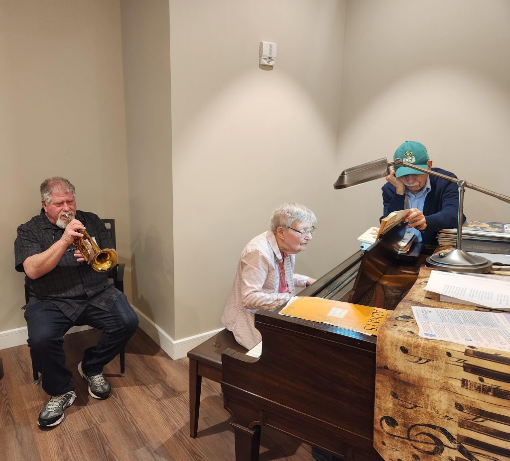 Residents enjoying a music session together.