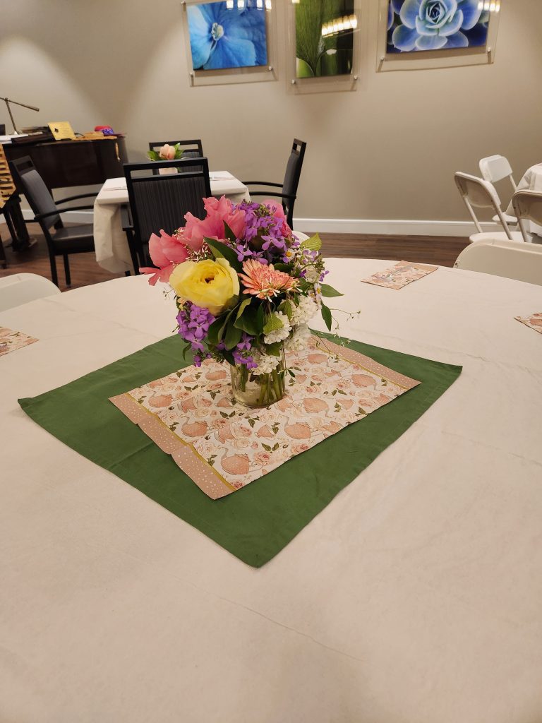 Colorful floral centerpiece on a dining table