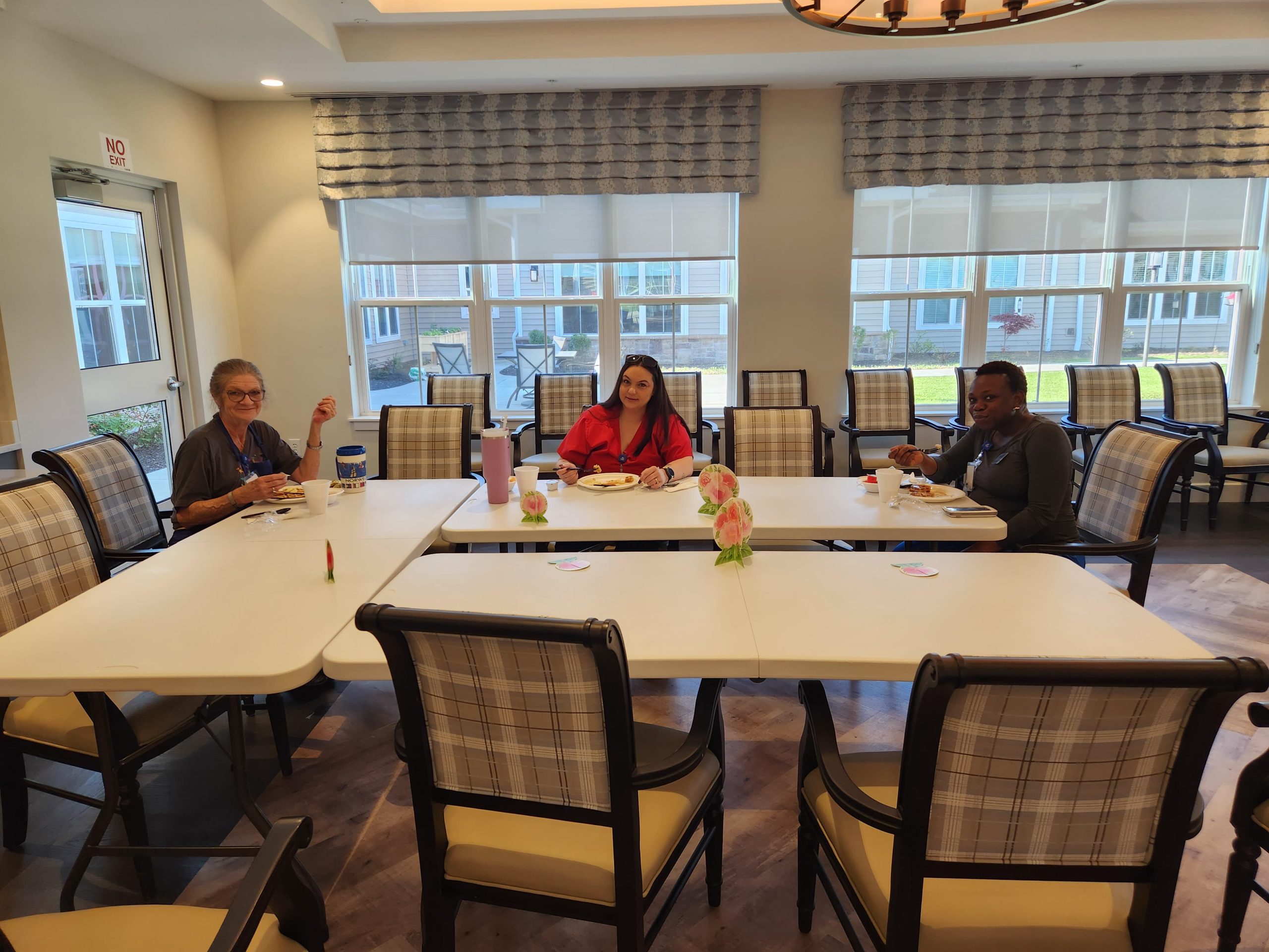 Residents enjoying a meal in the dining area
