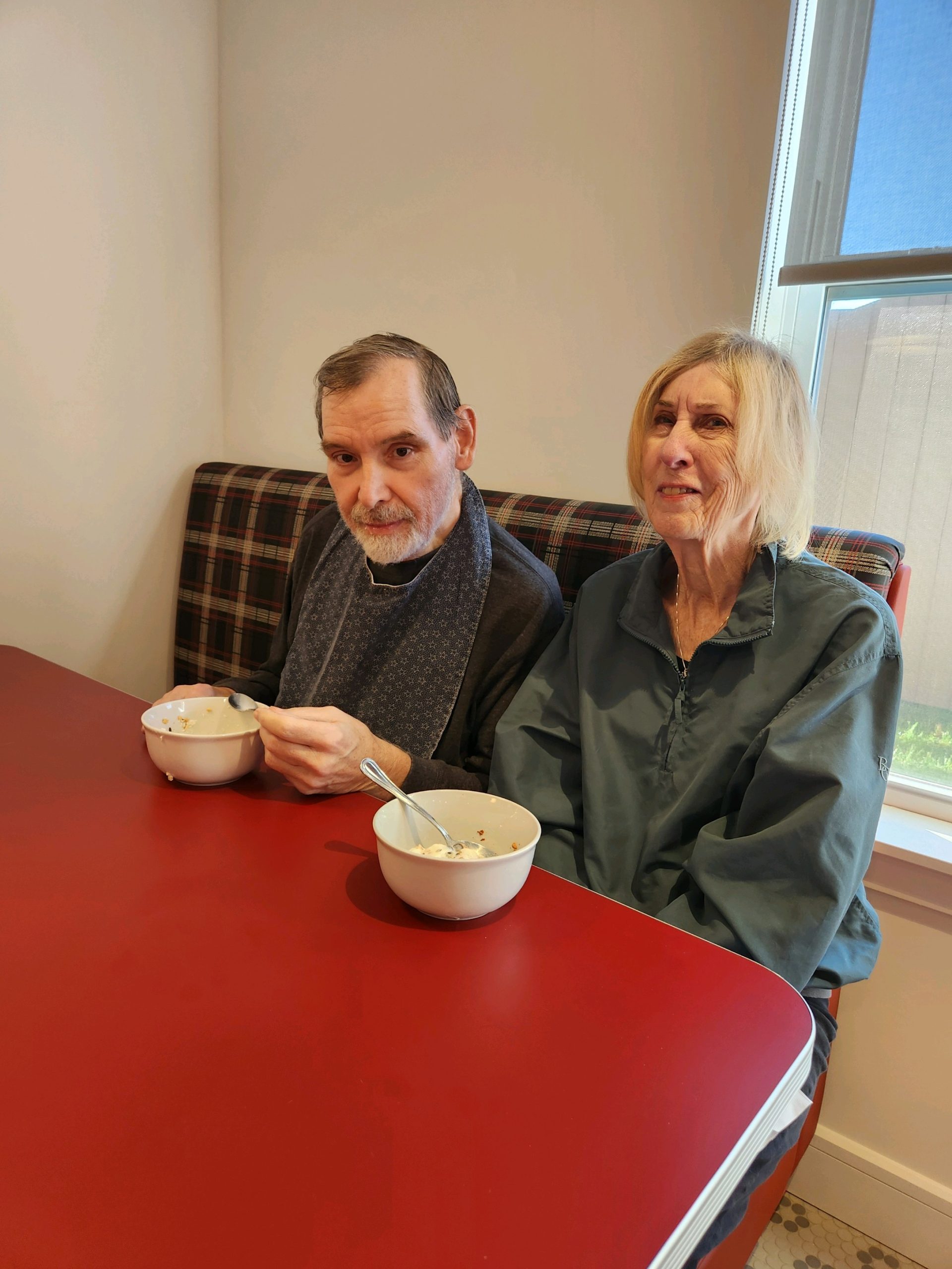Two residents enjoying a meal together