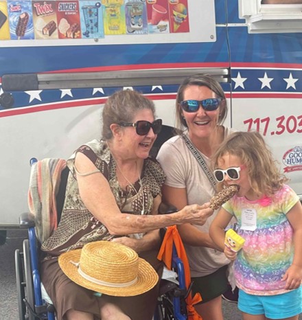 Residents enjoying ice cream at an outdoor event